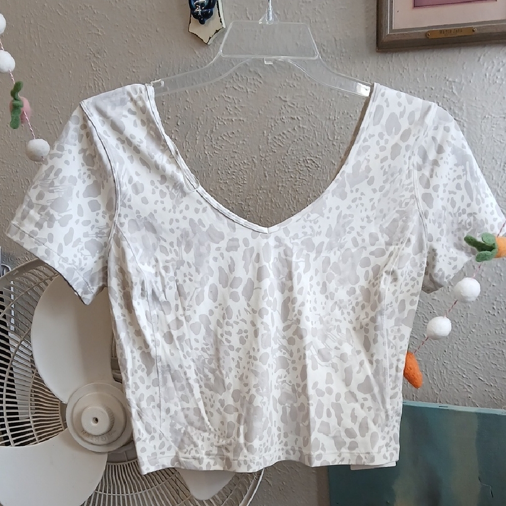 Lululemon Athletica White Leopard Crop Top